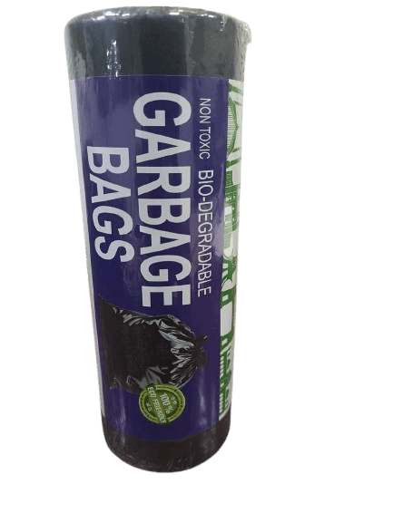 Roll of non-toxic biodegradable garbage bags in black with green eco-friendly label